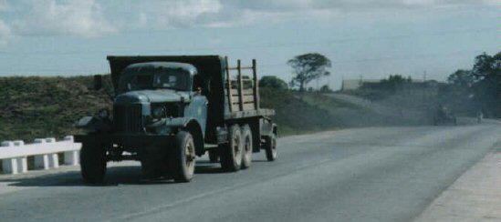 Priniciples of the California Clean Air Act do not apply in Cuba; note the horsecart and bicycle lost in the plume behind this multi-purpose vehicle.