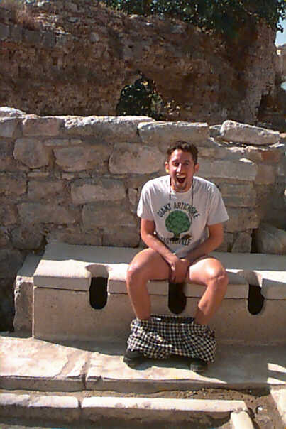 Fred tries out an ancient crapper in Ephesus