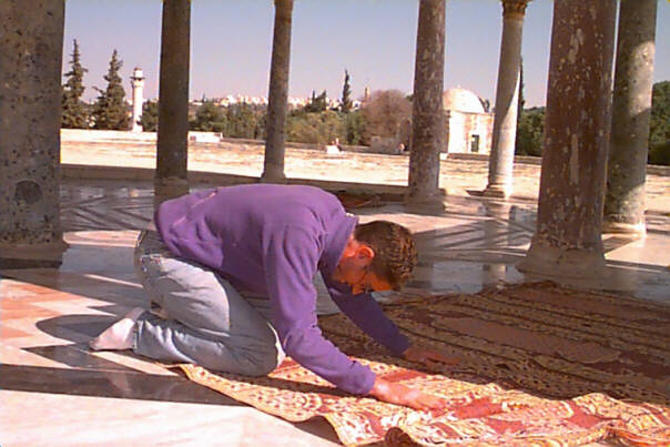 In full regalia at the Wailing Wall