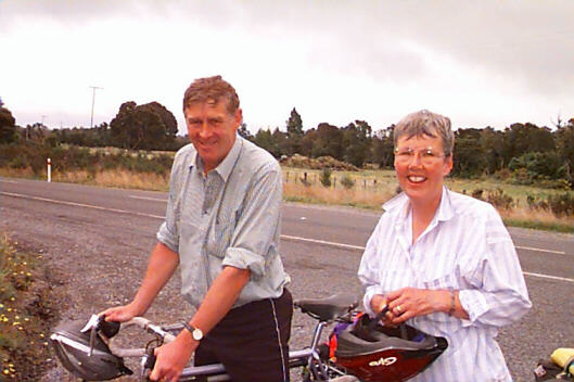 Gordon and Carol in the rain Ohakune's Giant (and dark) Carrot