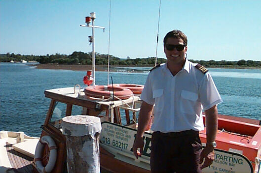 Captain Tim Black swan specs on Myall Lake